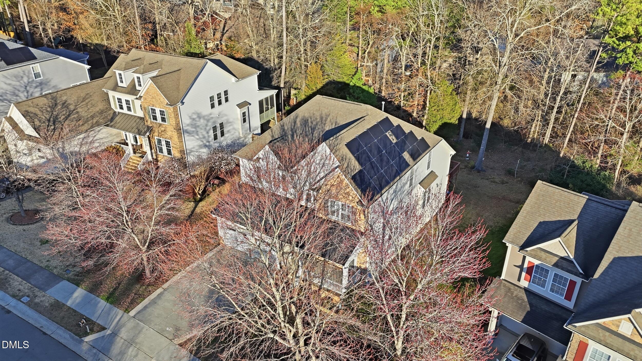 4803 Marena Place Durham, NC 27707 - Photo 36 of 42 a view of roof with sitting area