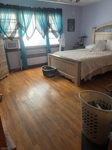 a bedroom with a bed and furniture