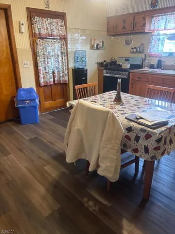 a room with furniture window and flat screen tv