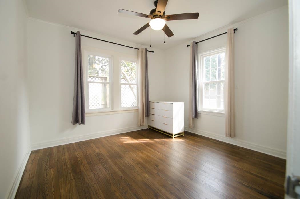 4572 Princeton Road Memphis, TN 38117 - Photo 15 of 24 Empty room featuring dark wood finished floors and a ceiling fan