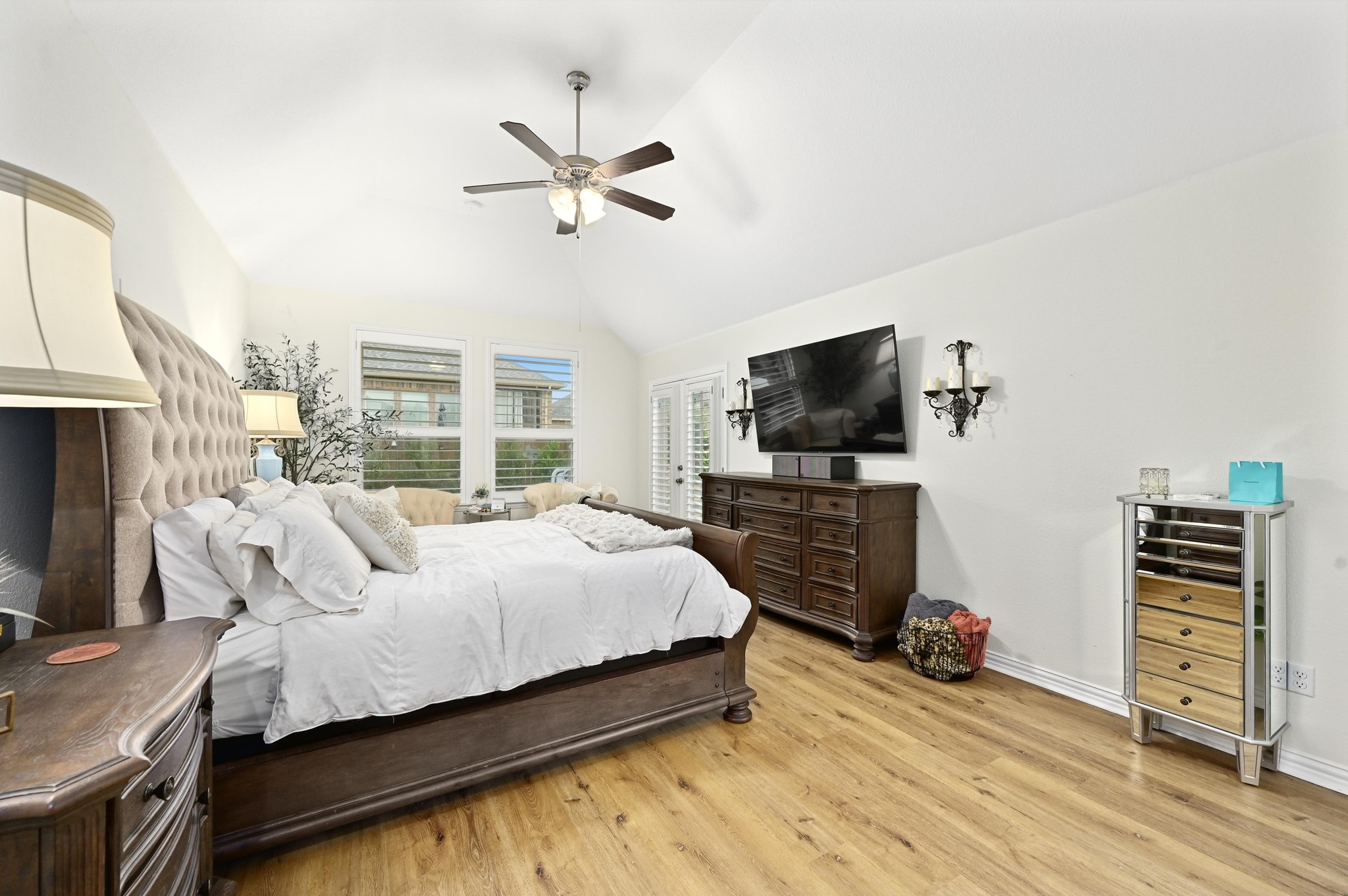 169 Fort Cobb Way Georgetown, TX 78628 - Photo 15 of 28 a bedroom with a bed and flat screen tv