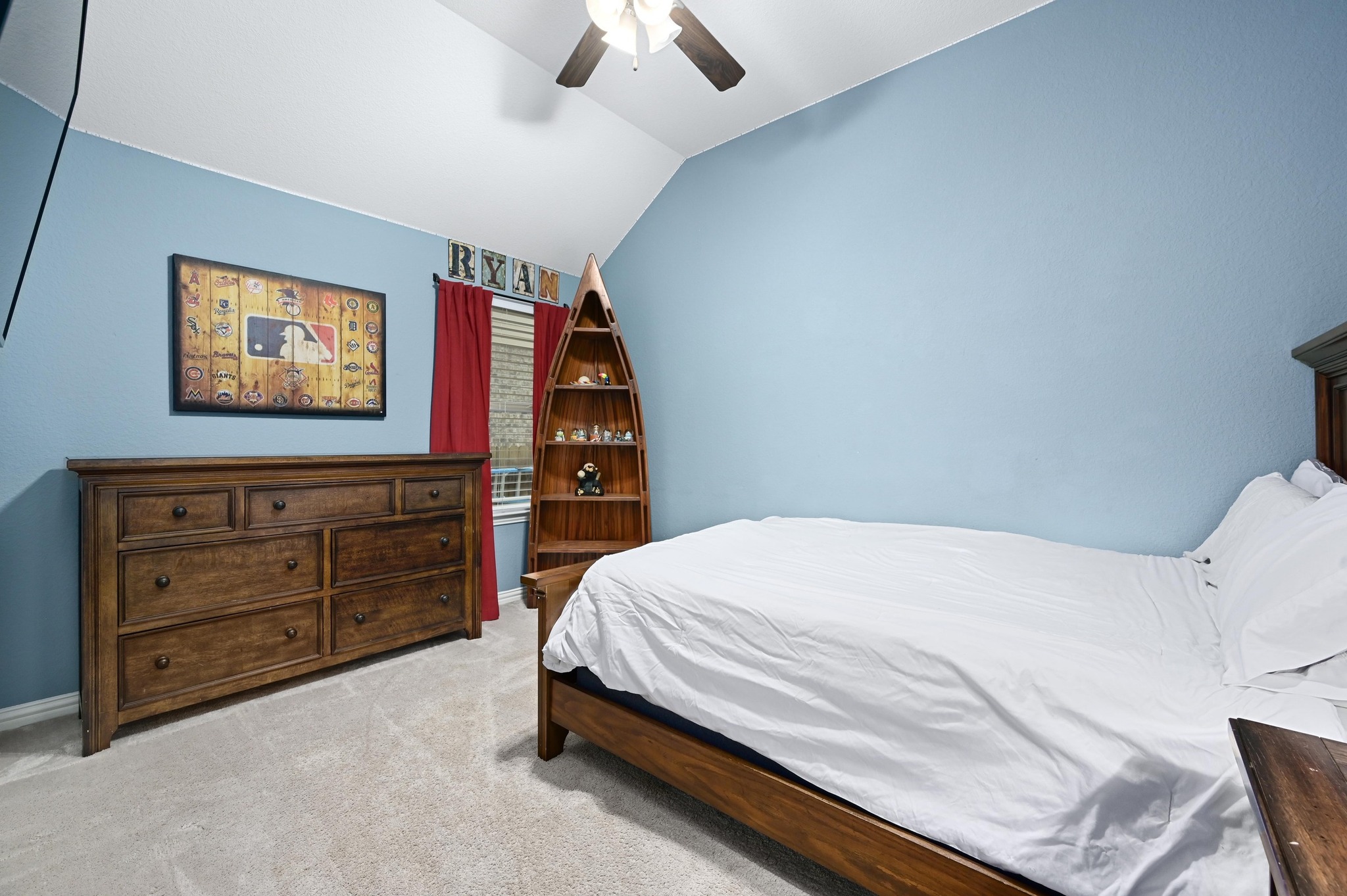 169 Fort Cobb Way Georgetown, TX 78628 - Photo 20 of 28 a bedroom with a bed and a dresser