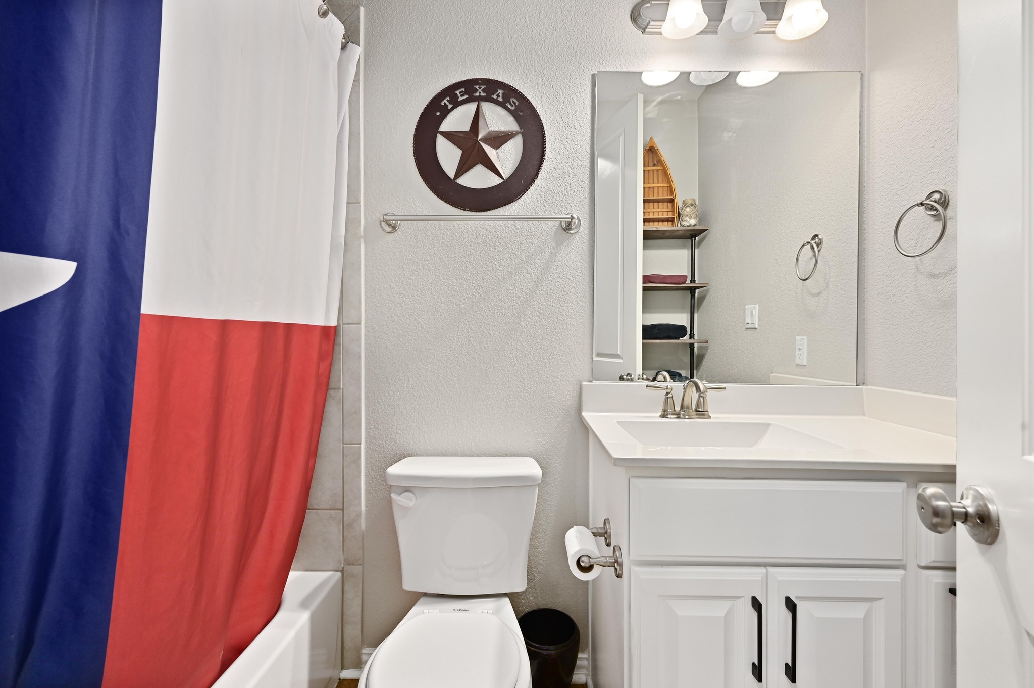 169 Fort Cobb Way Georgetown, TX 78628 - Photo 21 of 28 a bathroom with a sink a toilet and a mirror