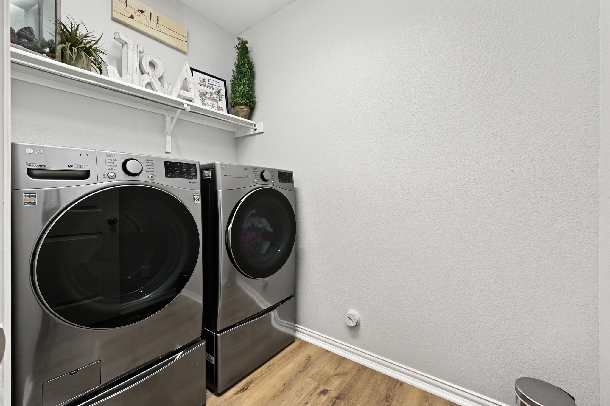 169 Fort Cobb Way Georgetown, TX 78628 - Photo 23 of 28 a utility room with dryer and washer