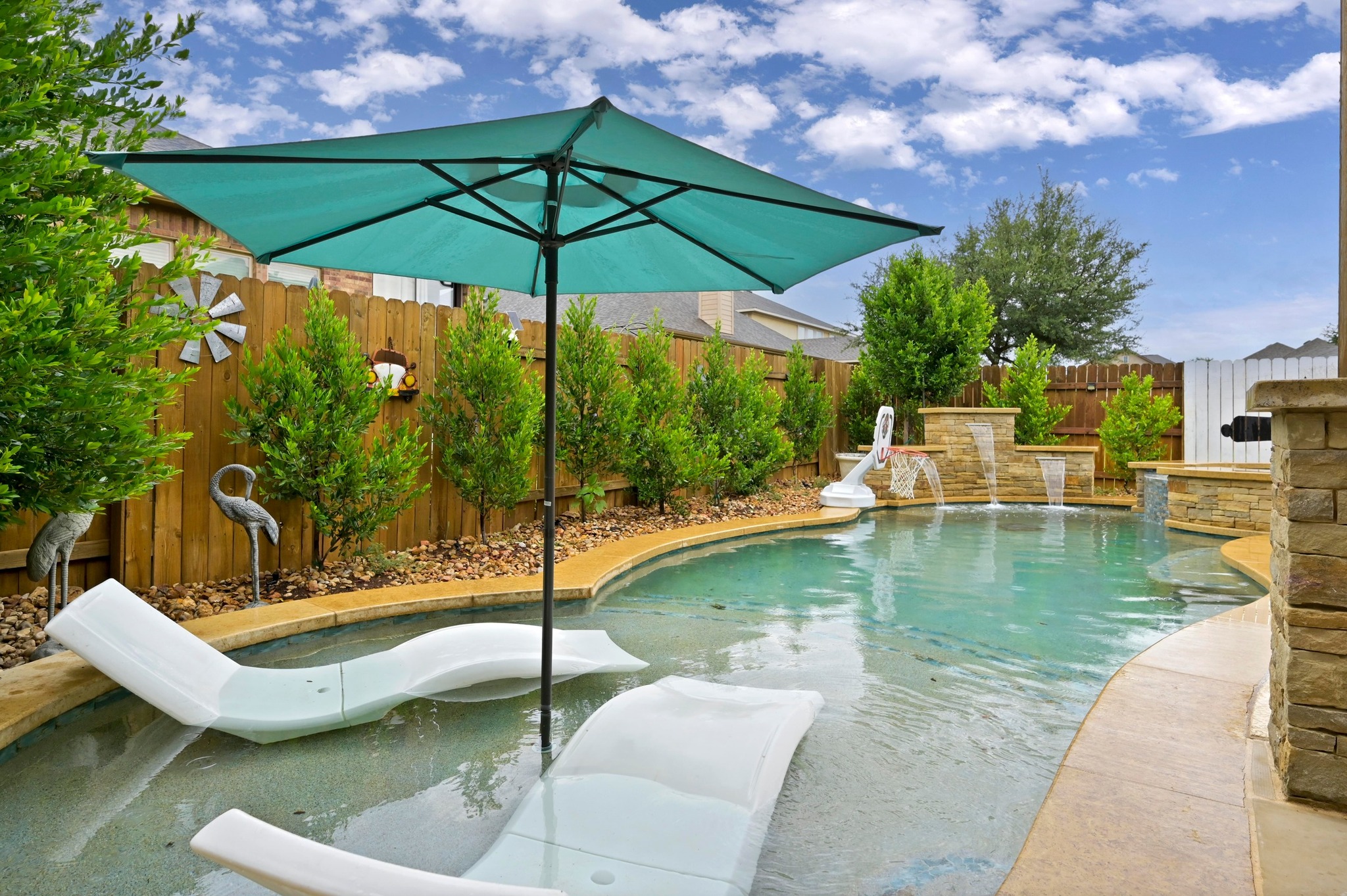 169 Fort Cobb Way Georgetown, TX 78628 - Photo 25 of 28 a view of a swimming pool with a patio