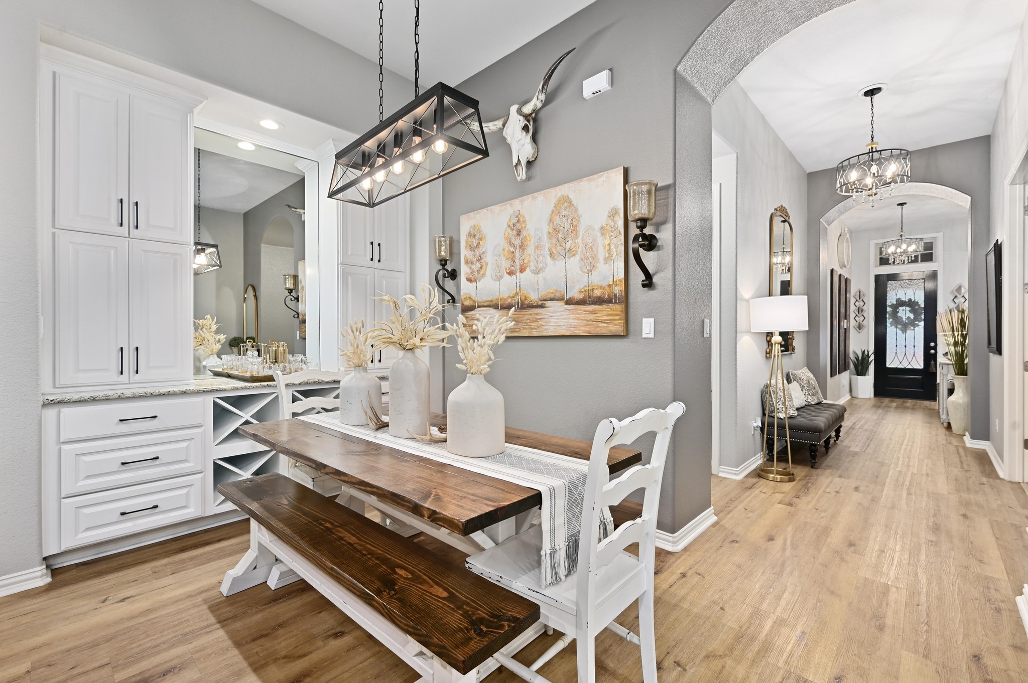 169 Fort Cobb Way Georgetown, TX 78628 - Photo 5 of 28 a view of a dining room with furniture and wooden floor
