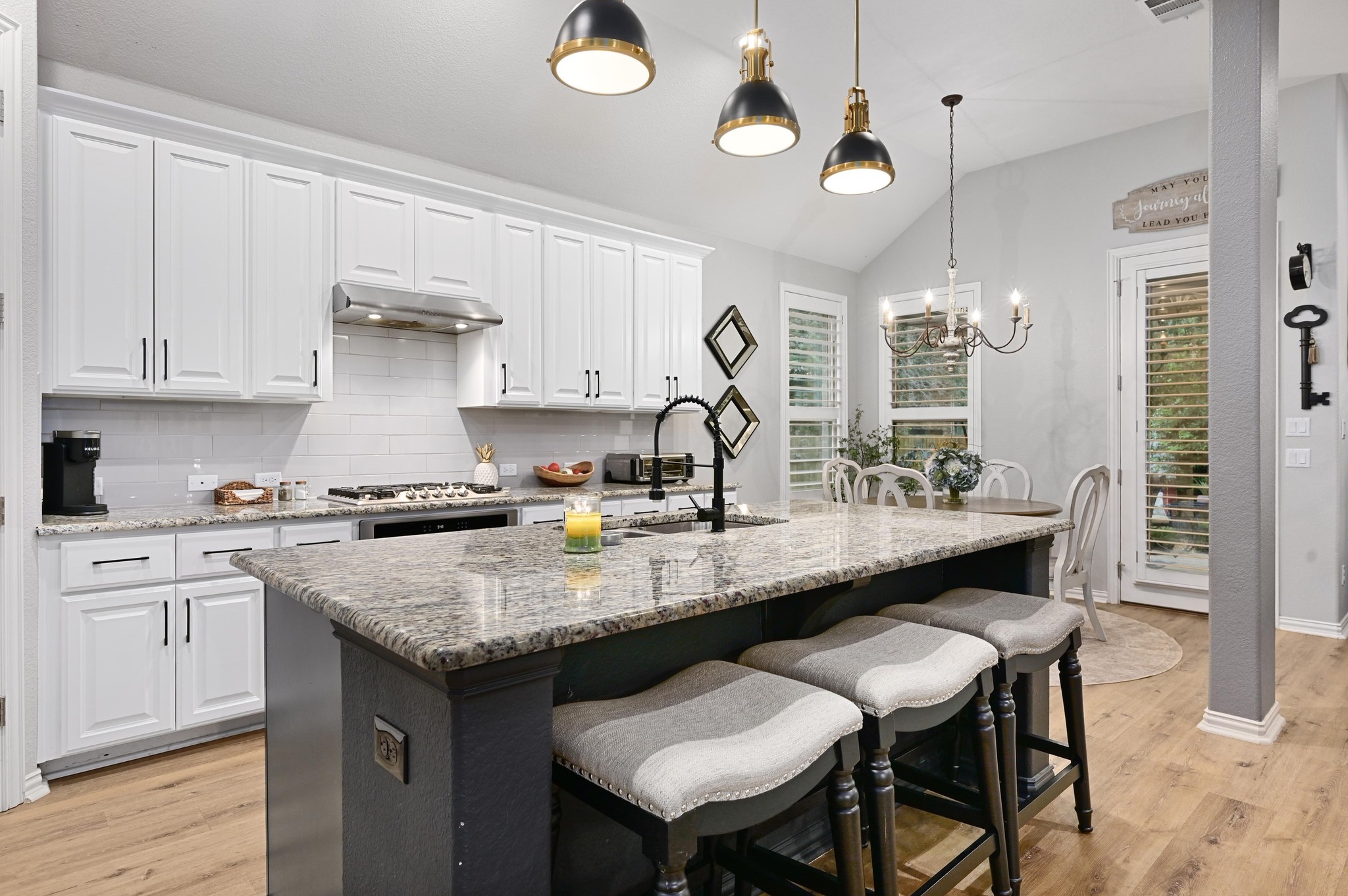 169 Fort Cobb Way Georgetown, TX 78628 - Photo 7 of 28 a kitchen with a counter space a sink and cabinets