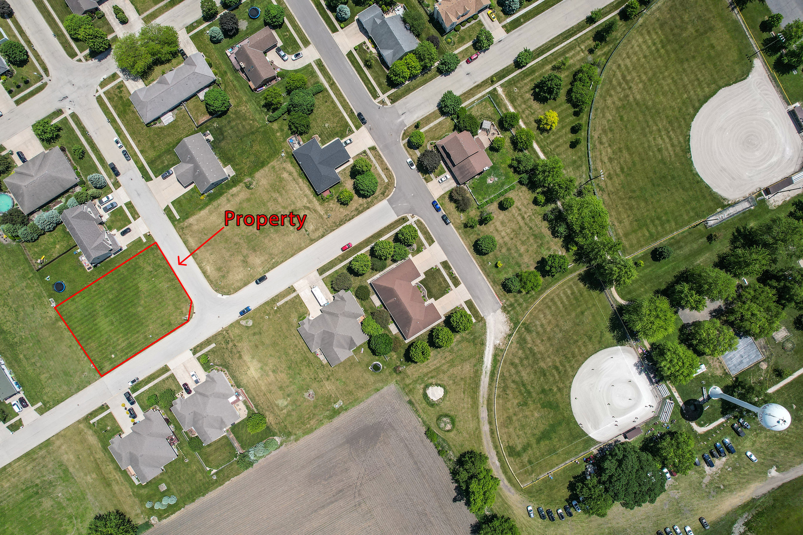 900-902 Center Street Mazon, IL 60444 - Photo 2 of 7 an aerial view of a house with a swimming pool and garden