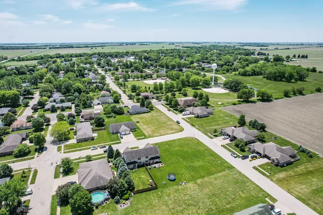 an aerial view of a house with a garden