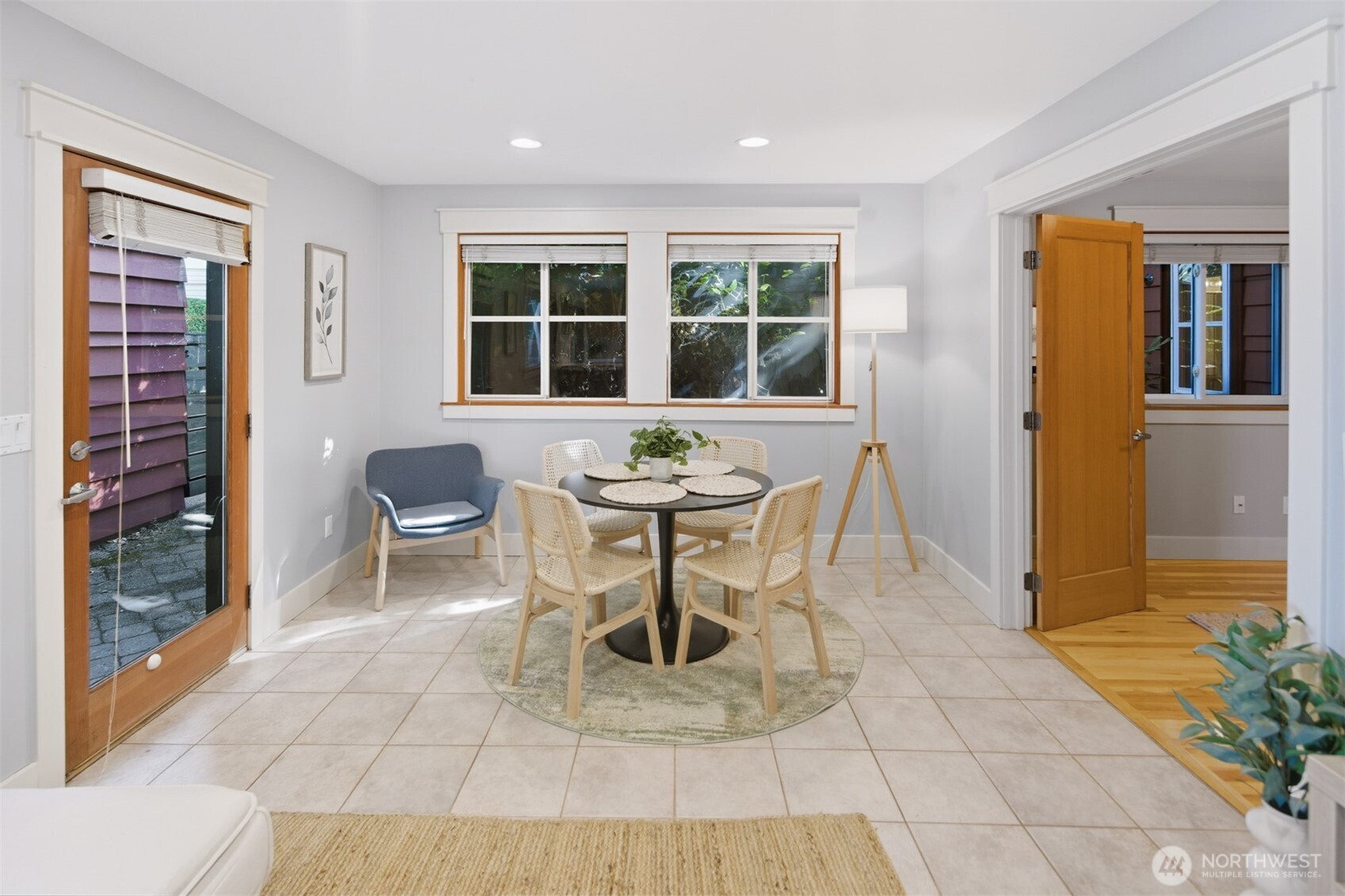 8770 Sand Point Way Northeast Seattle, WA 98115 - Photo 22 of 40 a dining room with furniture and window