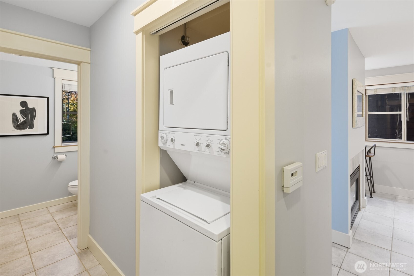 8770 Sand Point Way Northeast Seattle, WA 98115 - Photo 27 of 40 a view of bathroom with a washer and dryer
