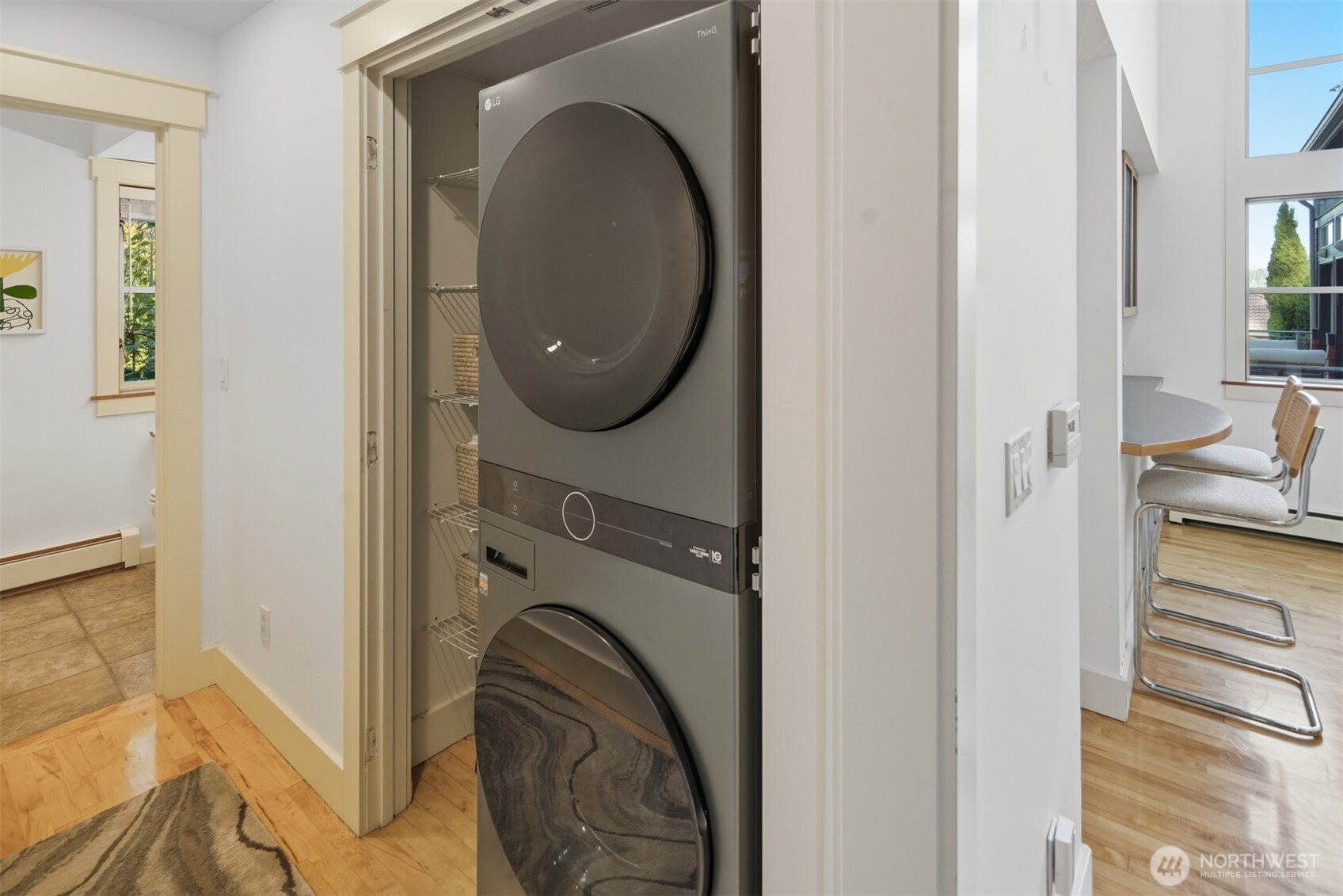 8770 Sand Point Way Northeast Seattle, WA 98115 - Photo 29 of 40 a view of a hallway with washer and dryer