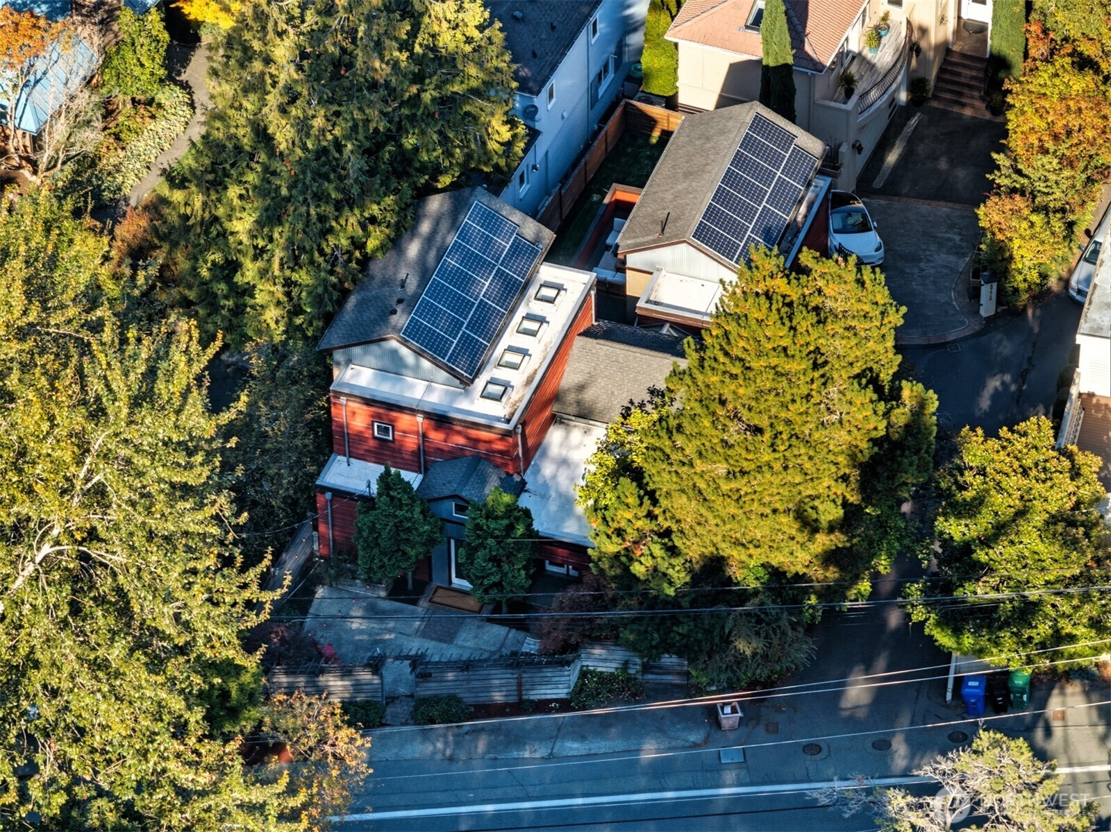 8770 Sand Point Way Northeast Seattle, WA 98115 - Photo 3 of 40 front view of a house with a tree