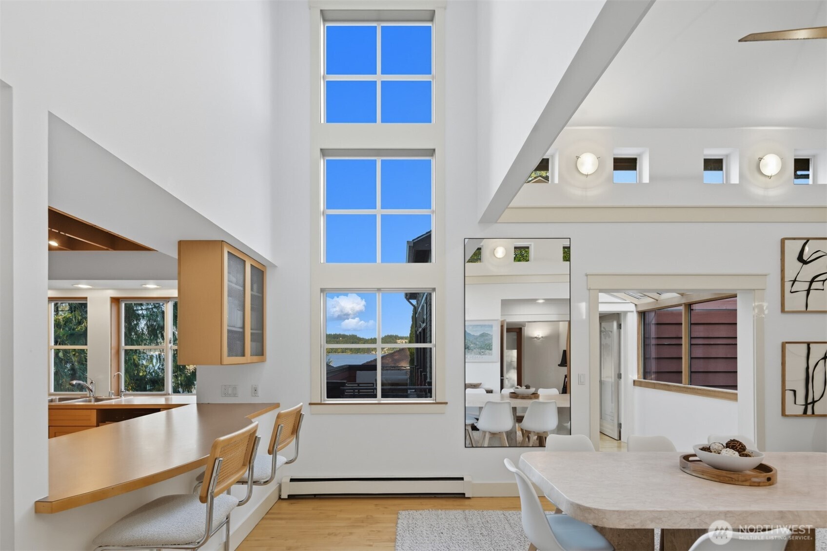 8770 Sand Point Way Northeast Seattle, WA 98115 - Photo 32 of 40 a view of a living room and entry way