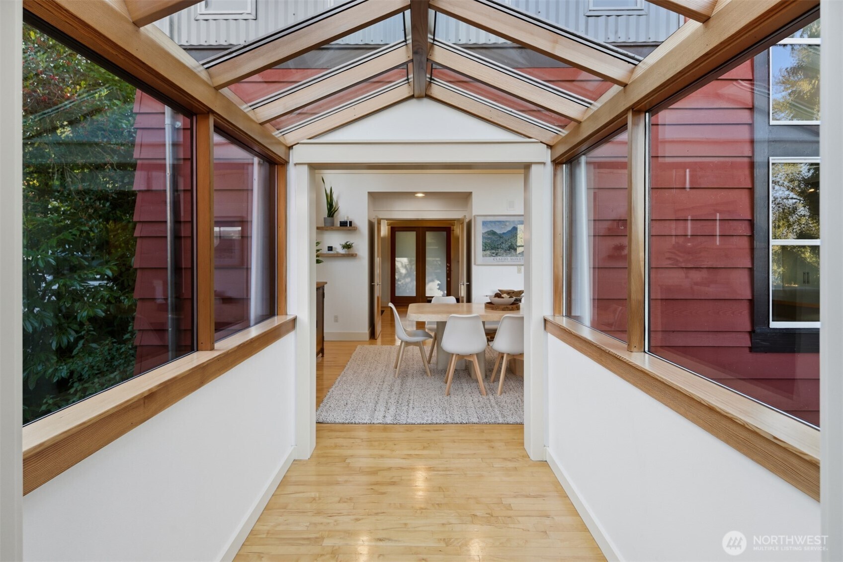 8770 Sand Point Way Northeast Seattle, WA 98115 - Photo 9 of 40 a view of a building with sitting area