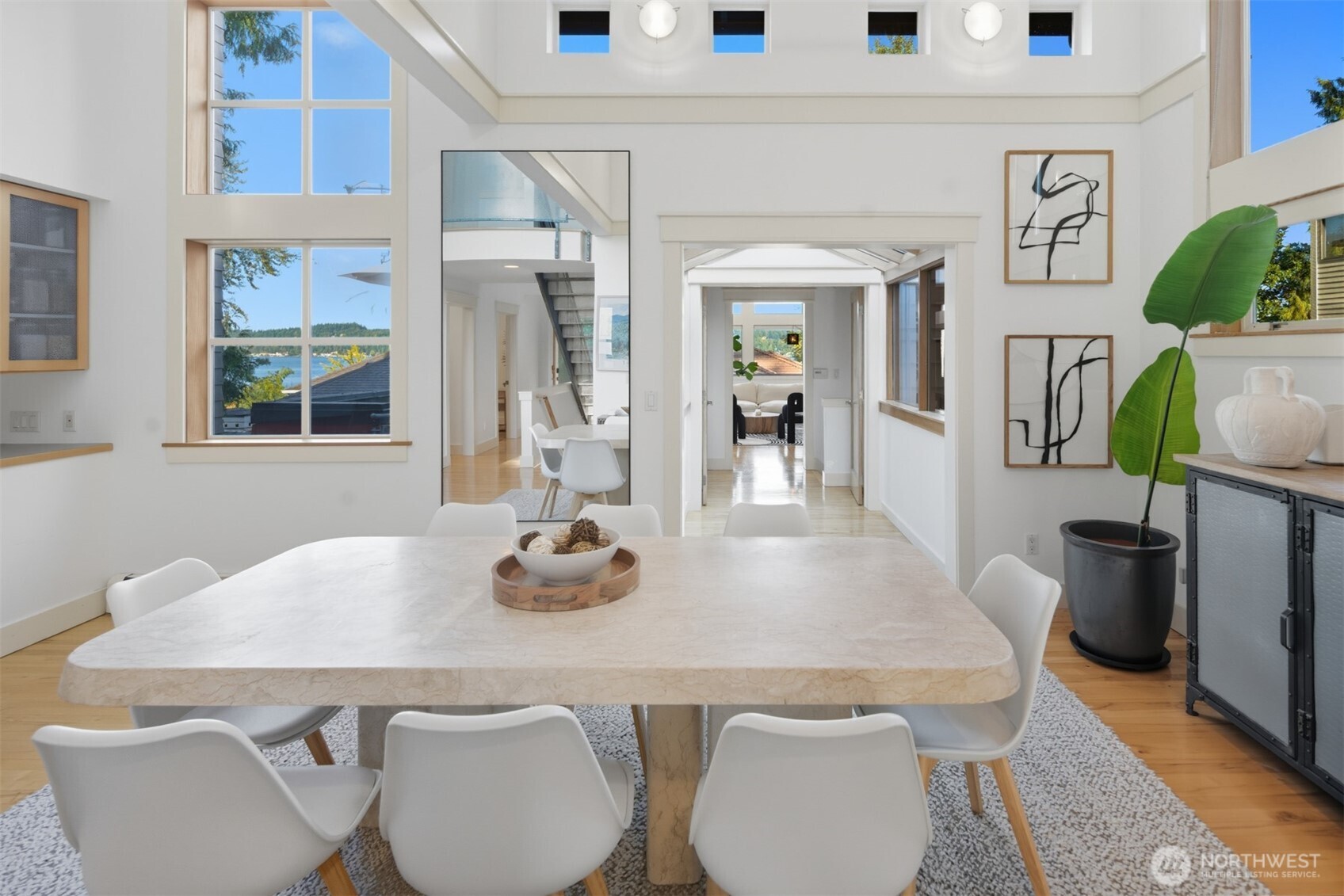 8770 Sand Point Way Northeast Seattle, WA 98115 - Photo 10 of 40 a dining room with furniture and window