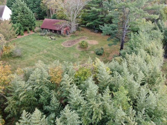 Lot A Merritts Path Rocky Point, NY 11778 - Photo 8 of 14 a view of a red house with a yard