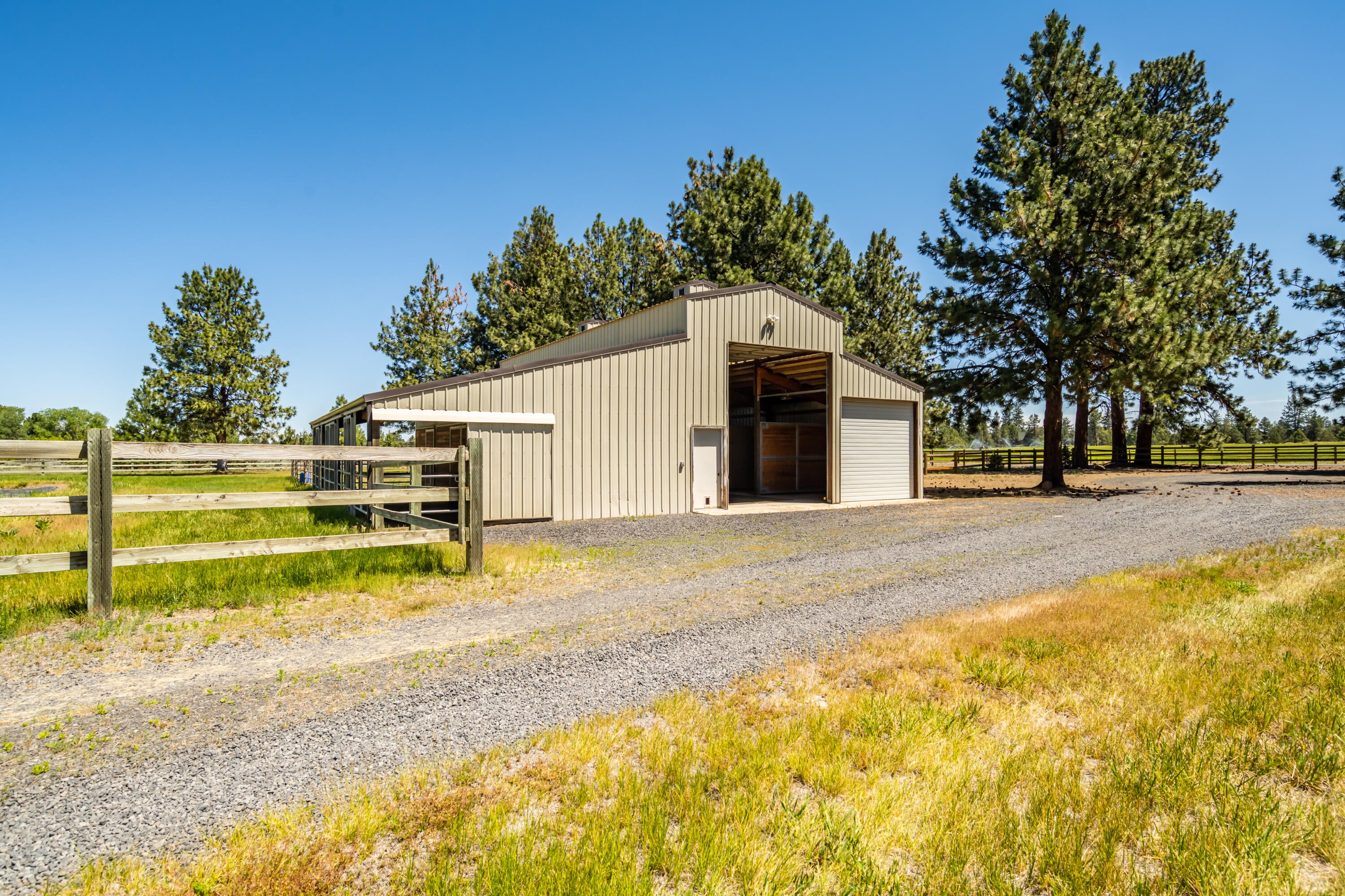 60696 Tekampe Road Bend, OR 97702 - Photo 50 of 61 4 stall barn with full pull through section