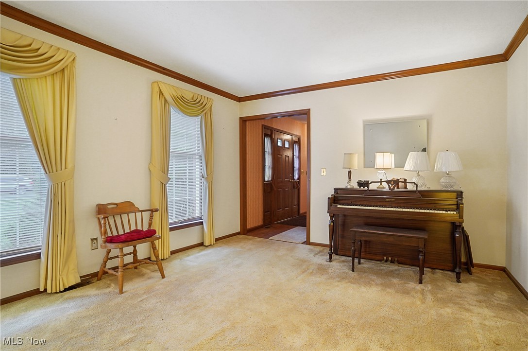 7300 Morley Road Painesville, OH 44077 - Photo 12 of 50 Sitting room featuring ornamental molding and light carpet