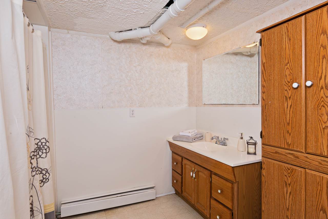 3760 Rockfish Road Grottoes, VA 24441 - Photo 18 of 34 a bathroom with a sink and a mirror