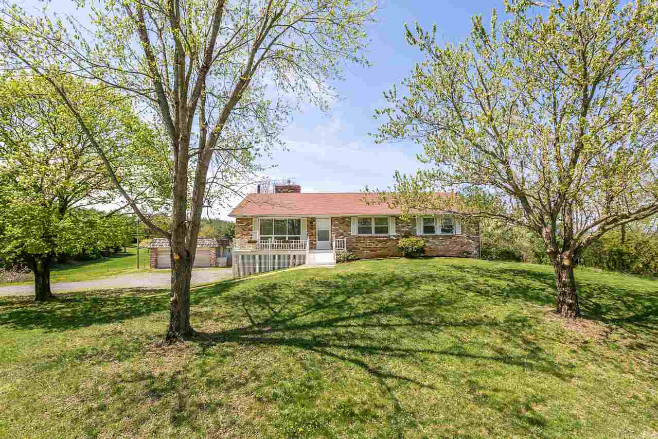 3760 Rockfish Road Grottoes, VA 24441 - Photo 20 of 34 a front view of a house with a yard