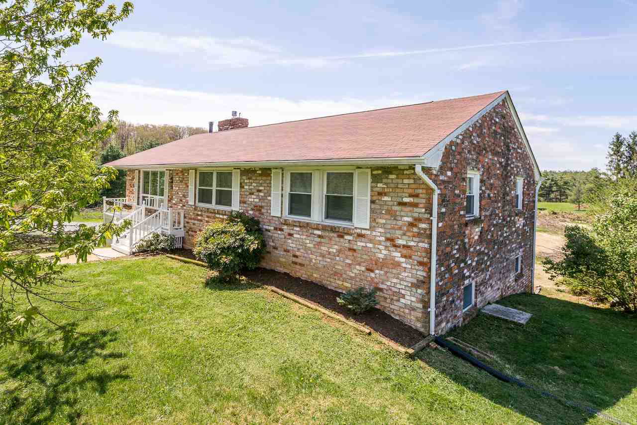 3760 Rockfish Road Grottoes, VA 24441 - Photo 21 of 34 a front view of a house with garden