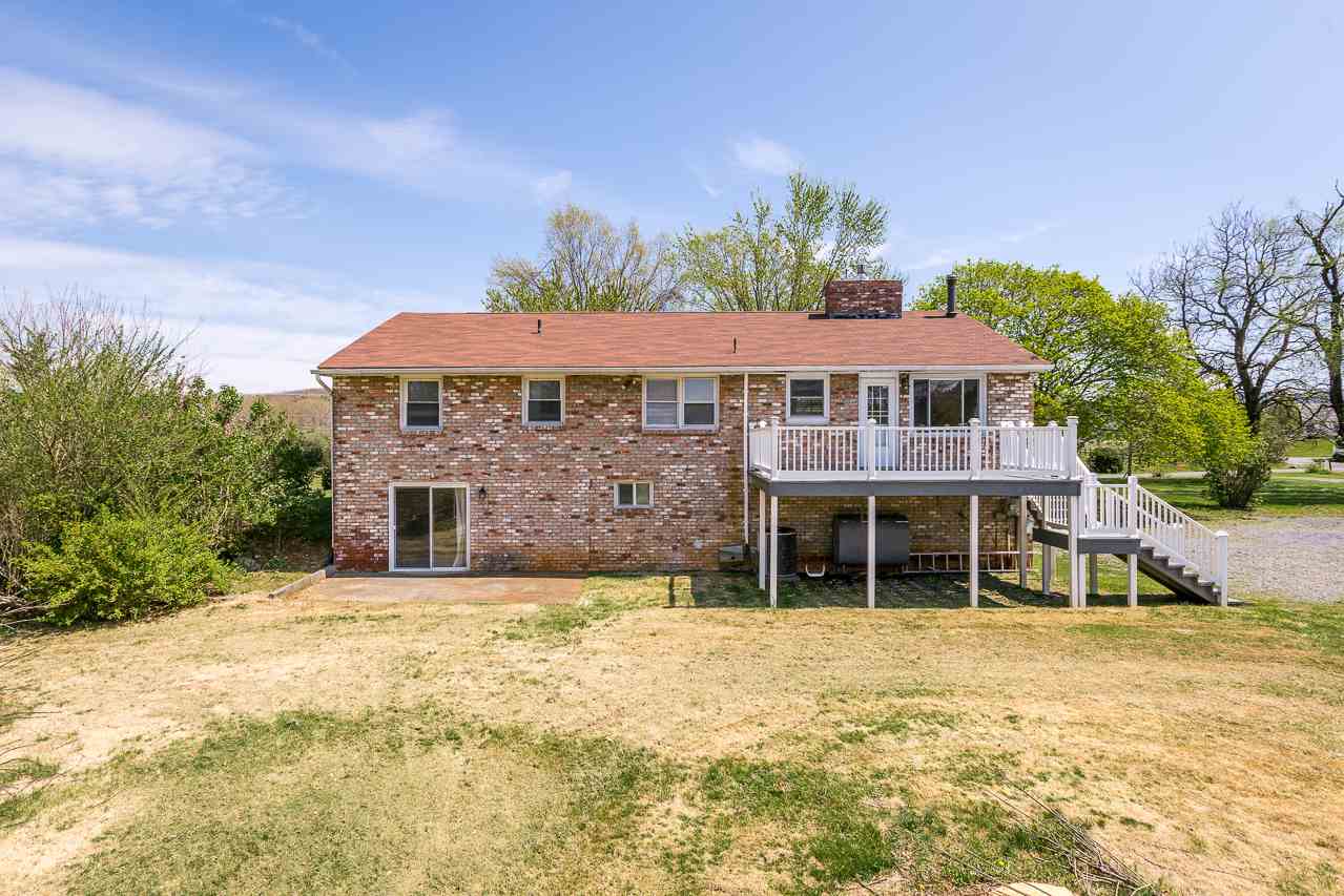 3760 Rockfish Road Grottoes, VA 24441 - Photo 25 of 34 a front view of a house with a garden