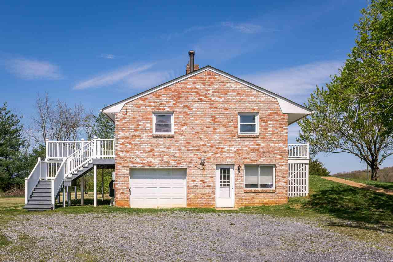 3760 Rockfish Road Grottoes, VA 24441 - Photo 28 of 34 a front view of a house with a yard