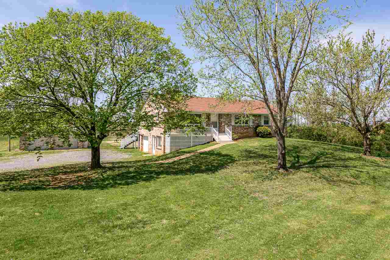 3760 Rockfish Road Grottoes, VA 24441 - Photo 32 of 34 a view of a tree in front of a house with a big yard