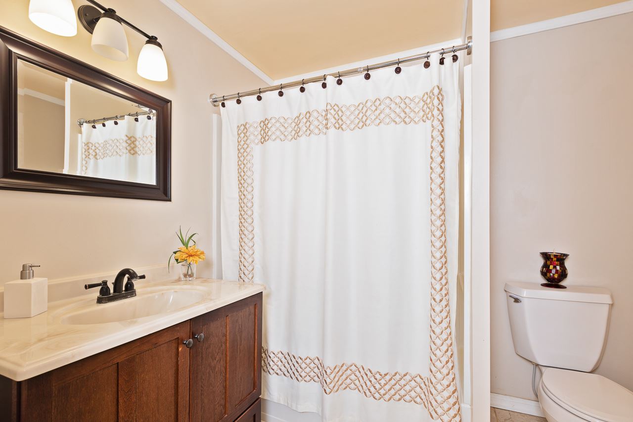 3760 Rockfish Road Grottoes, VA 24441 - Photo 8 of 34 a bathroom with a sink and a mirror