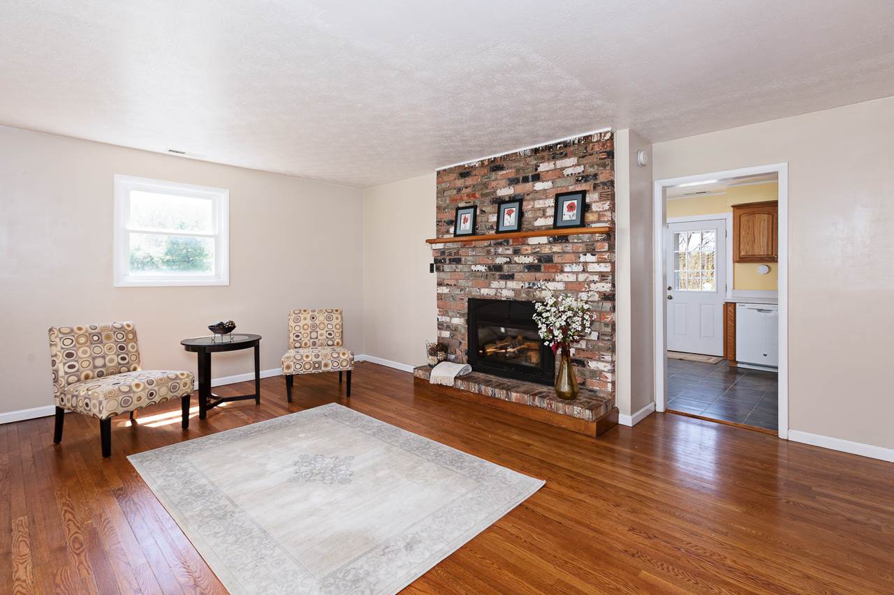 3760 Rockfish Road Grottoes, VA 24441 - Photo 9 of 34 a living room with furniture and a fireplace