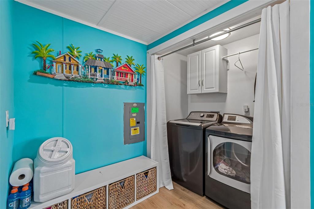 14242 Action Street Brooksville, FL 34613 - Photo 17 of 60 a utility room with dryer and washer