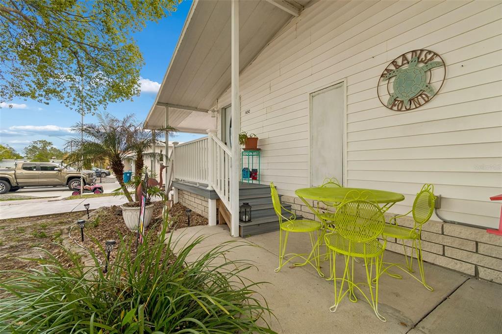 14242 Action Street Brooksville, FL 34613 - Photo 2 of 60 a view of an outdoor space with seating