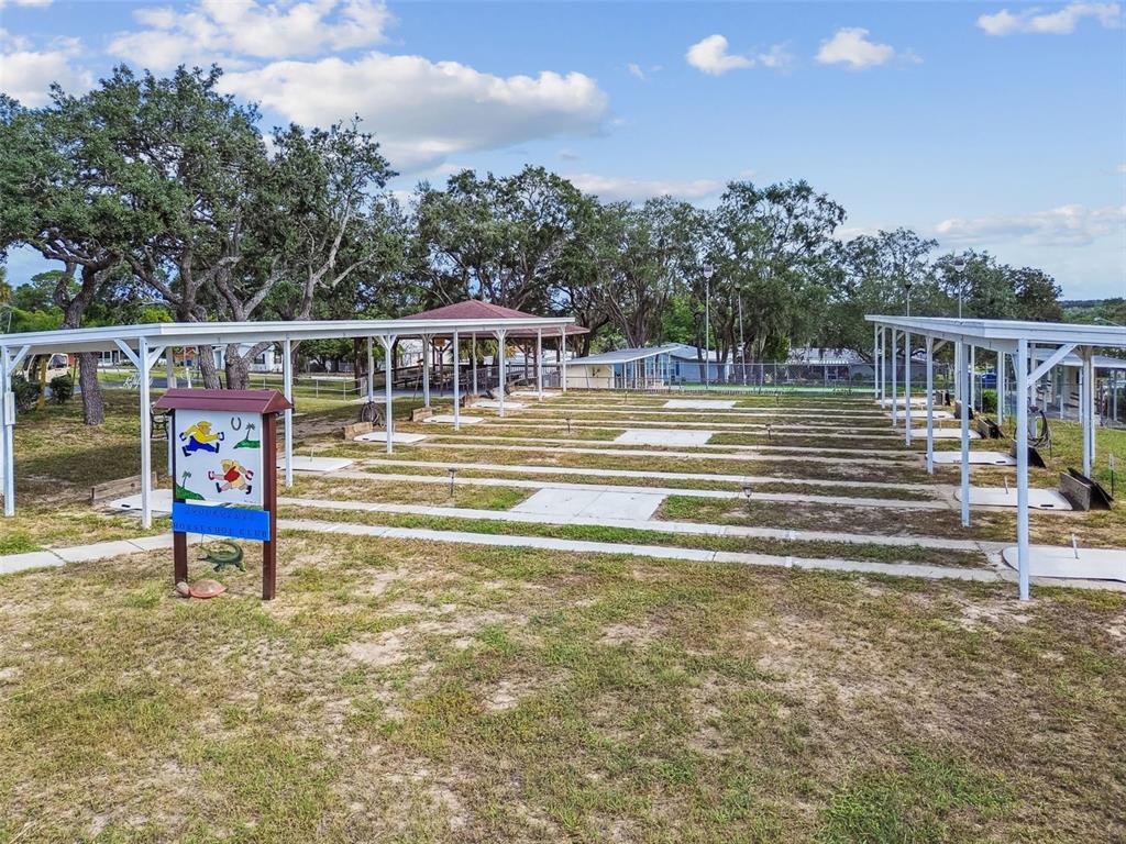 14242 Action Street Brooksville, FL 34613 - Photo 40 of 60 a view of a swimming pool with a patio
