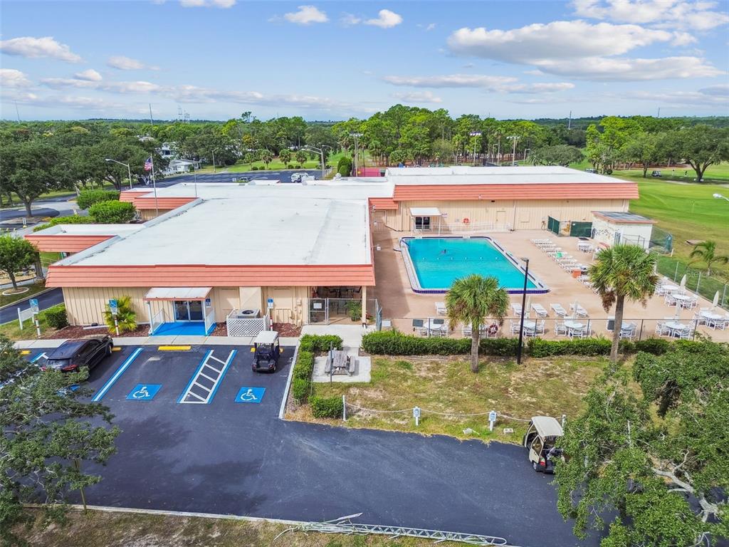14242 Action Street Brooksville, FL 34613 - Photo 43 of 60 aerial view of a house with a garden