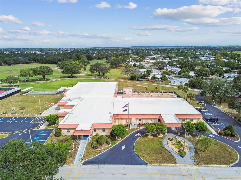 14242 Action Street Brooksville, FL 34613 - Photo 45 of 60 an aerial view of a house with a garden