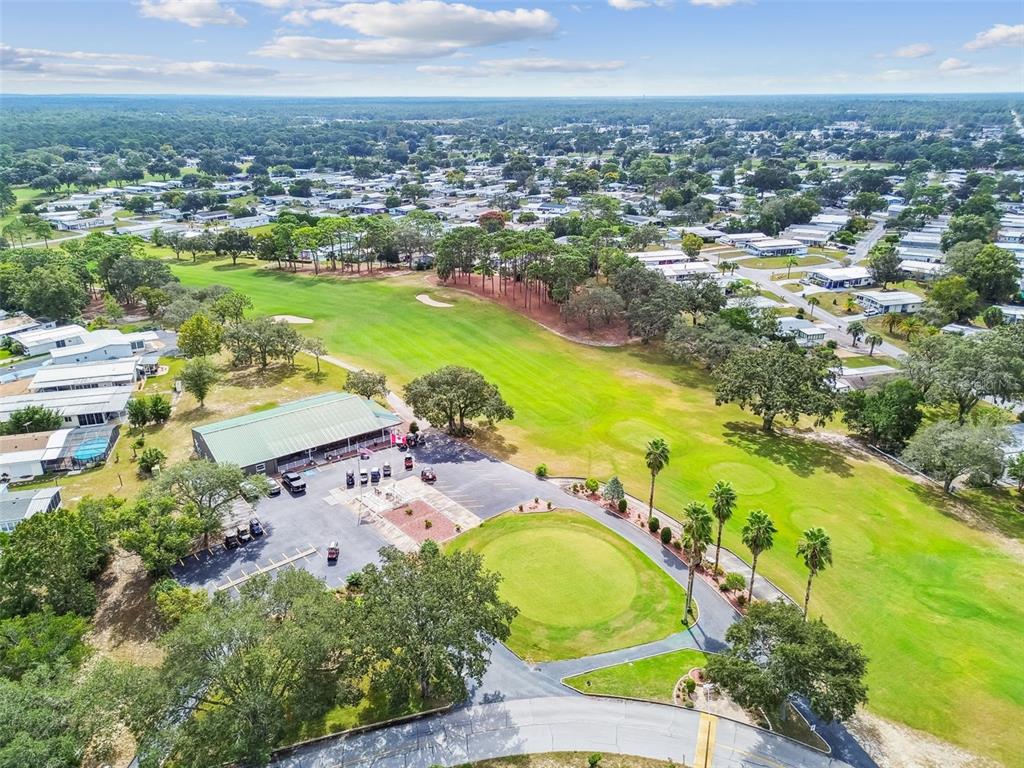 14242 Action Street Brooksville, FL 34613 - Photo 50 of 60 an aerial view of tennis court