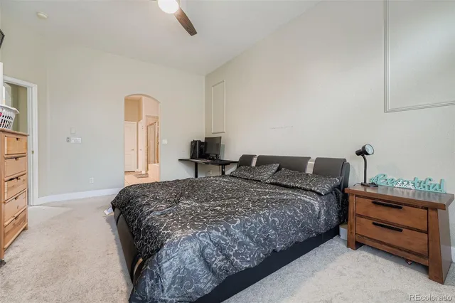 a bedroom with a bed and a cabinets