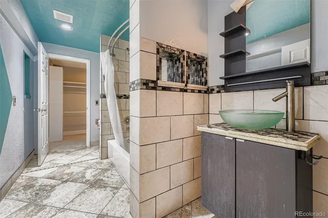 a view of storage and utility room