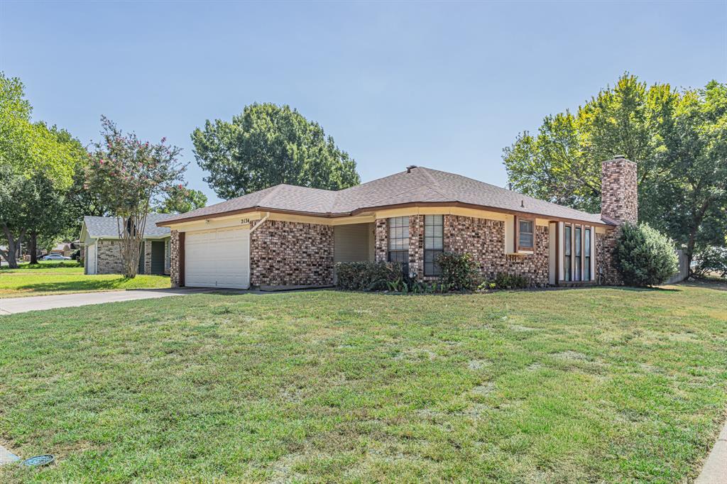 2134 Reverchon Drive Arlington, TX 76017 - Photo 1 of 23 House sits on the corner, offering a large yard to enjoy .