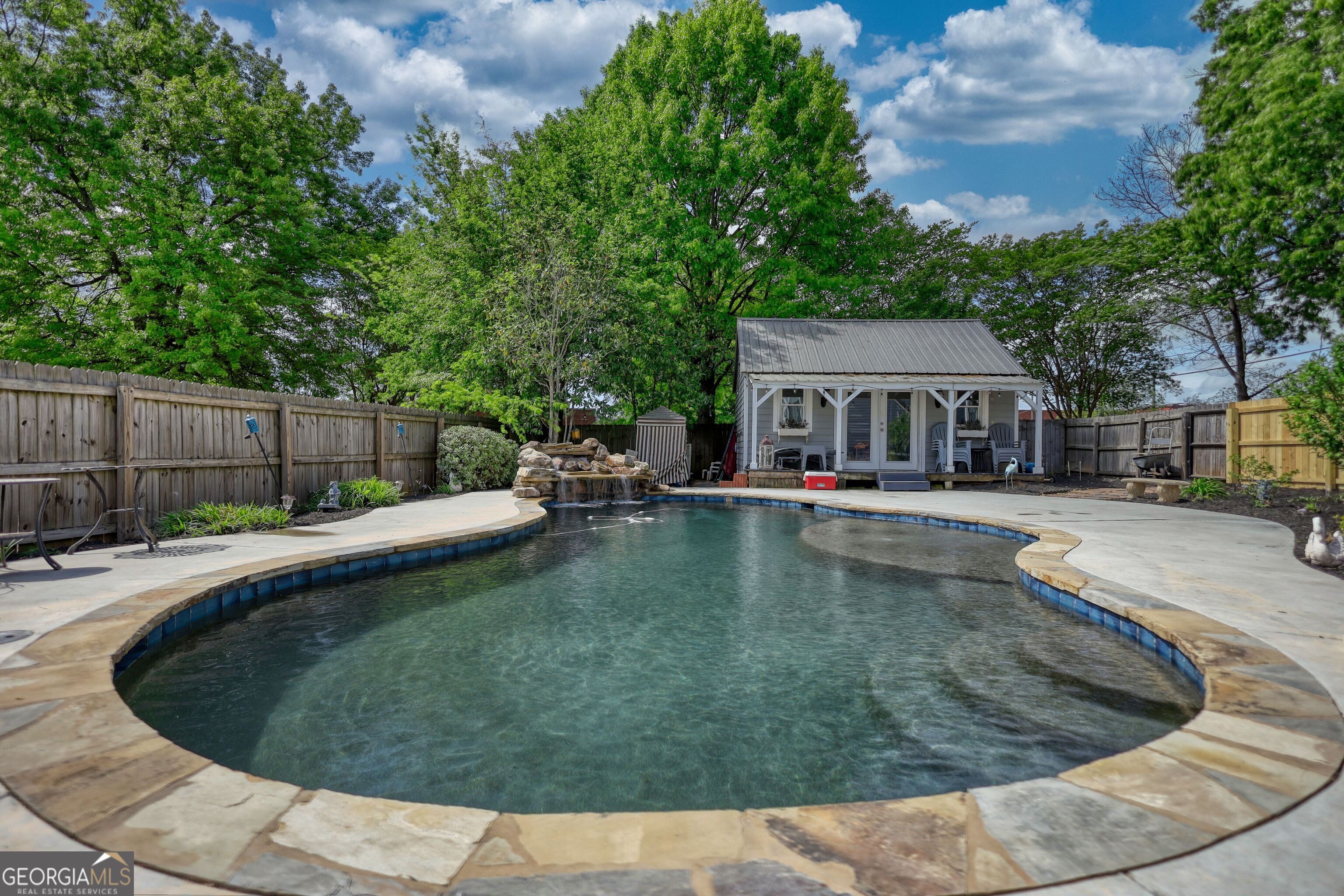 172 North 2nd Street Madison, GA 30650 - Photo 15 of 69 a view of a house with swimming pool