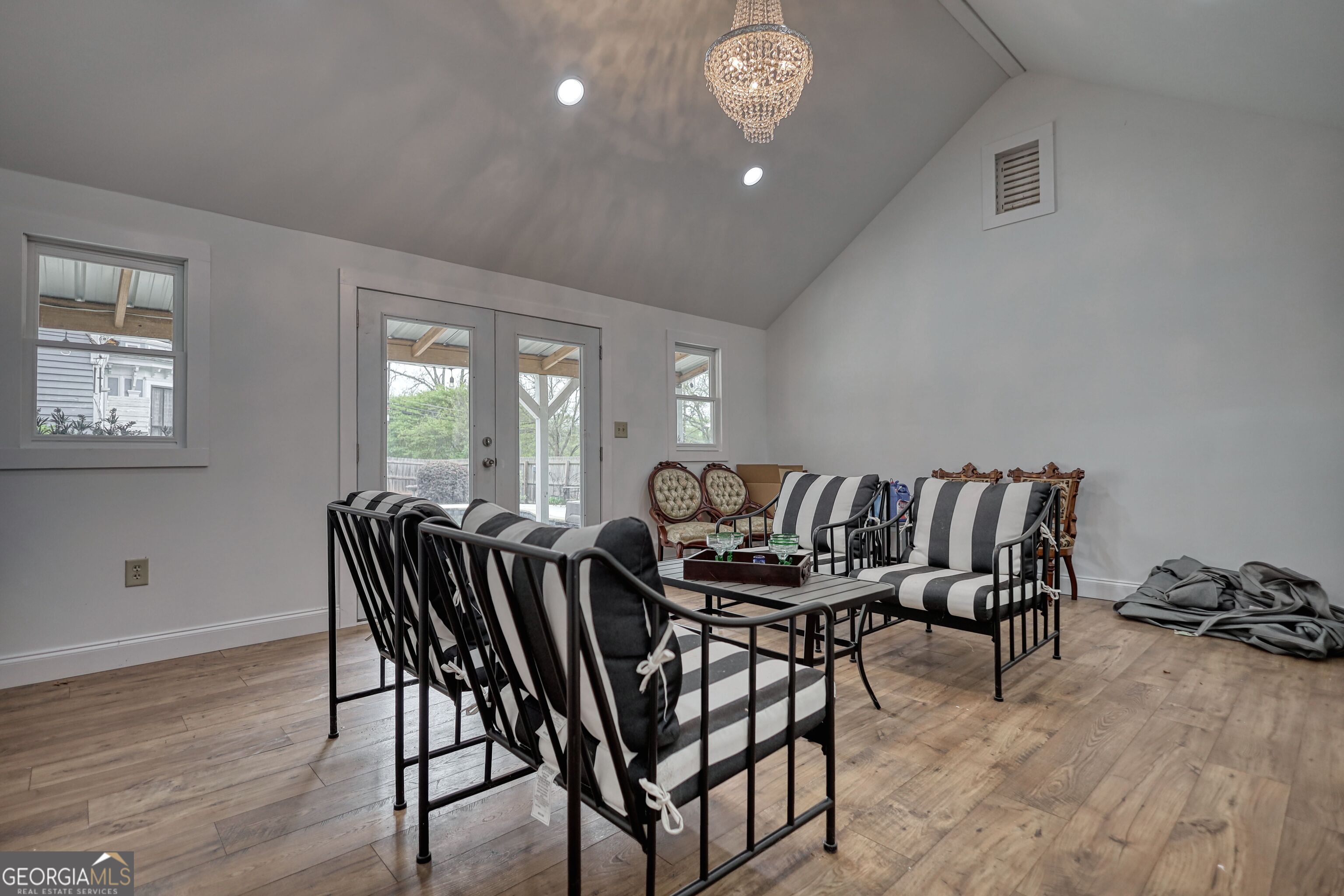 172 North 2nd Street Madison, GA 30650 - Photo 19 of 69 a view of a dining room with furniture and wooden floor