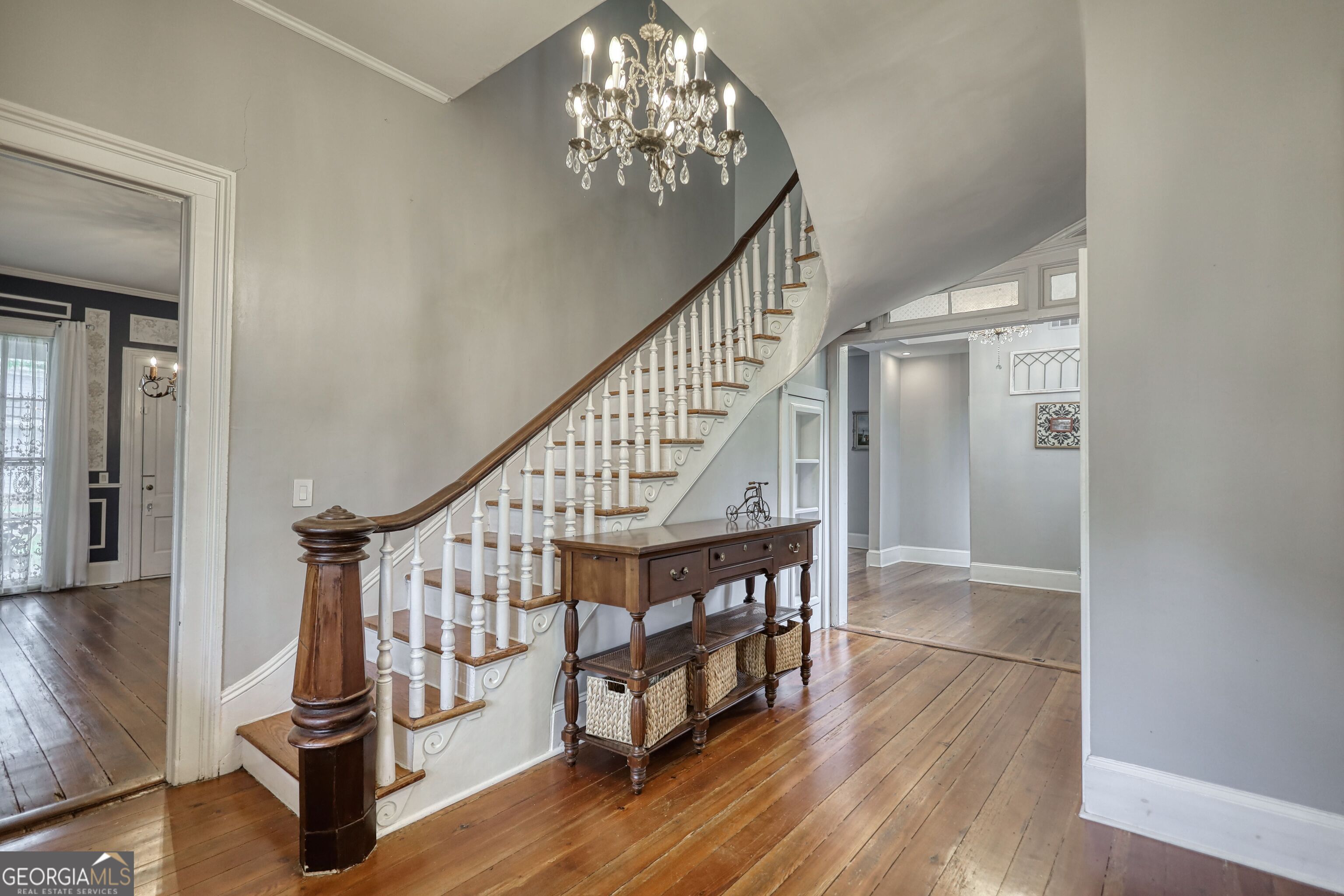 172 North 2nd Street Madison, GA 30650 - Photo 21 of 69 a view of entryway with wooden floor and stairs