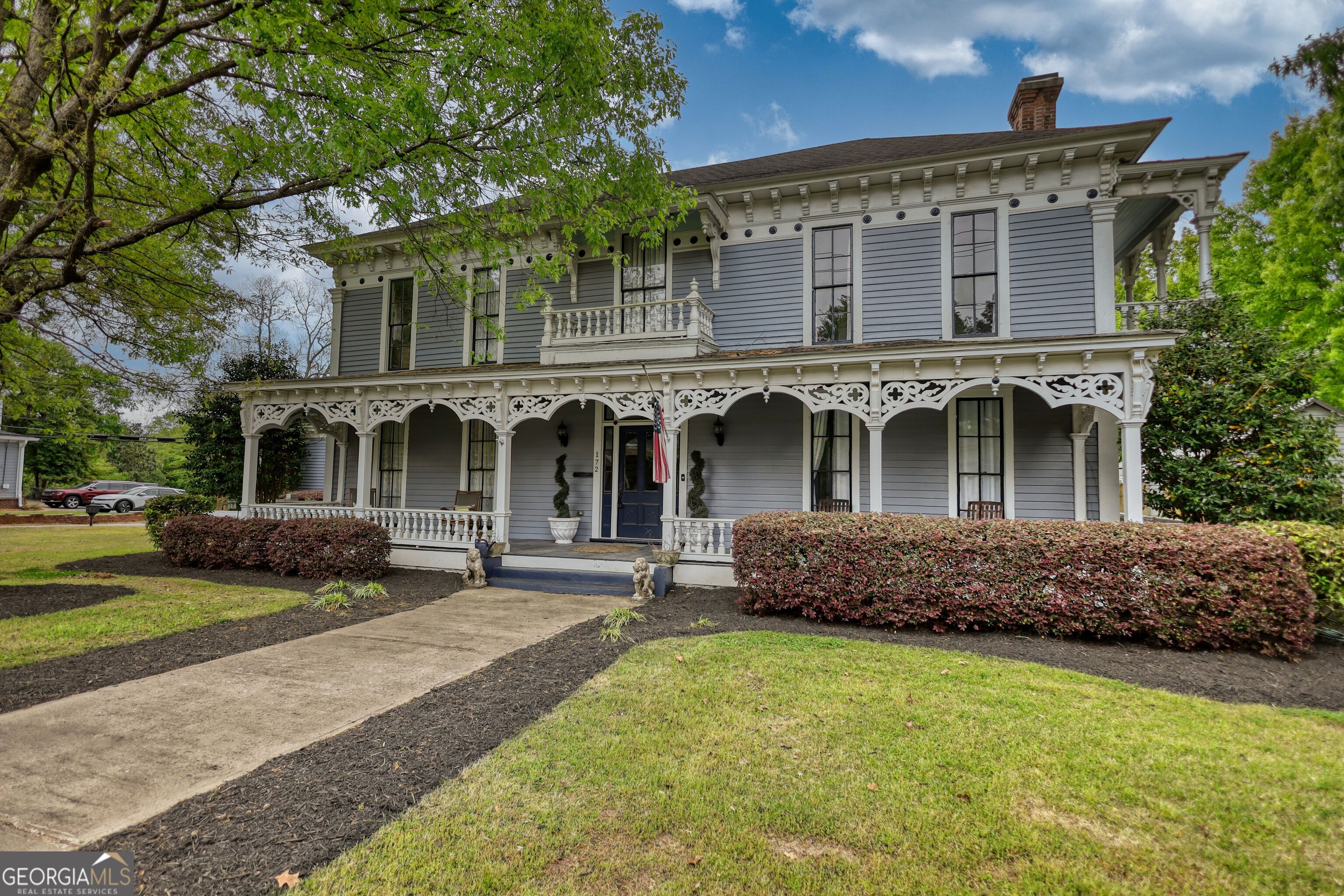 172 North 2nd Street Madison, GA 30650 - Photo 3 of 69 front view of a house with a garden