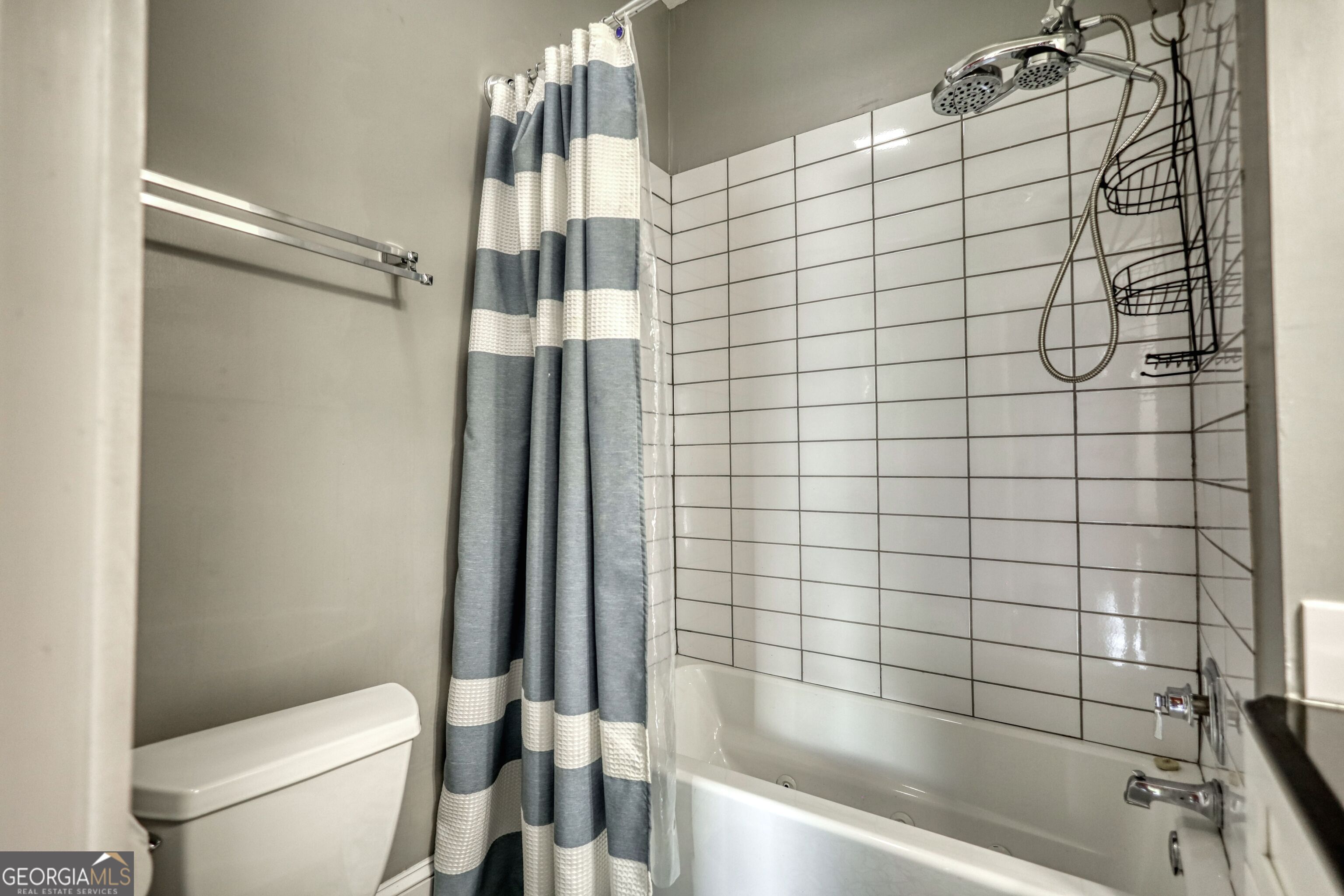 172 North 2nd Street Madison, GA 30650 - Photo 62 of 69 a bathroom with a shower and a toilet