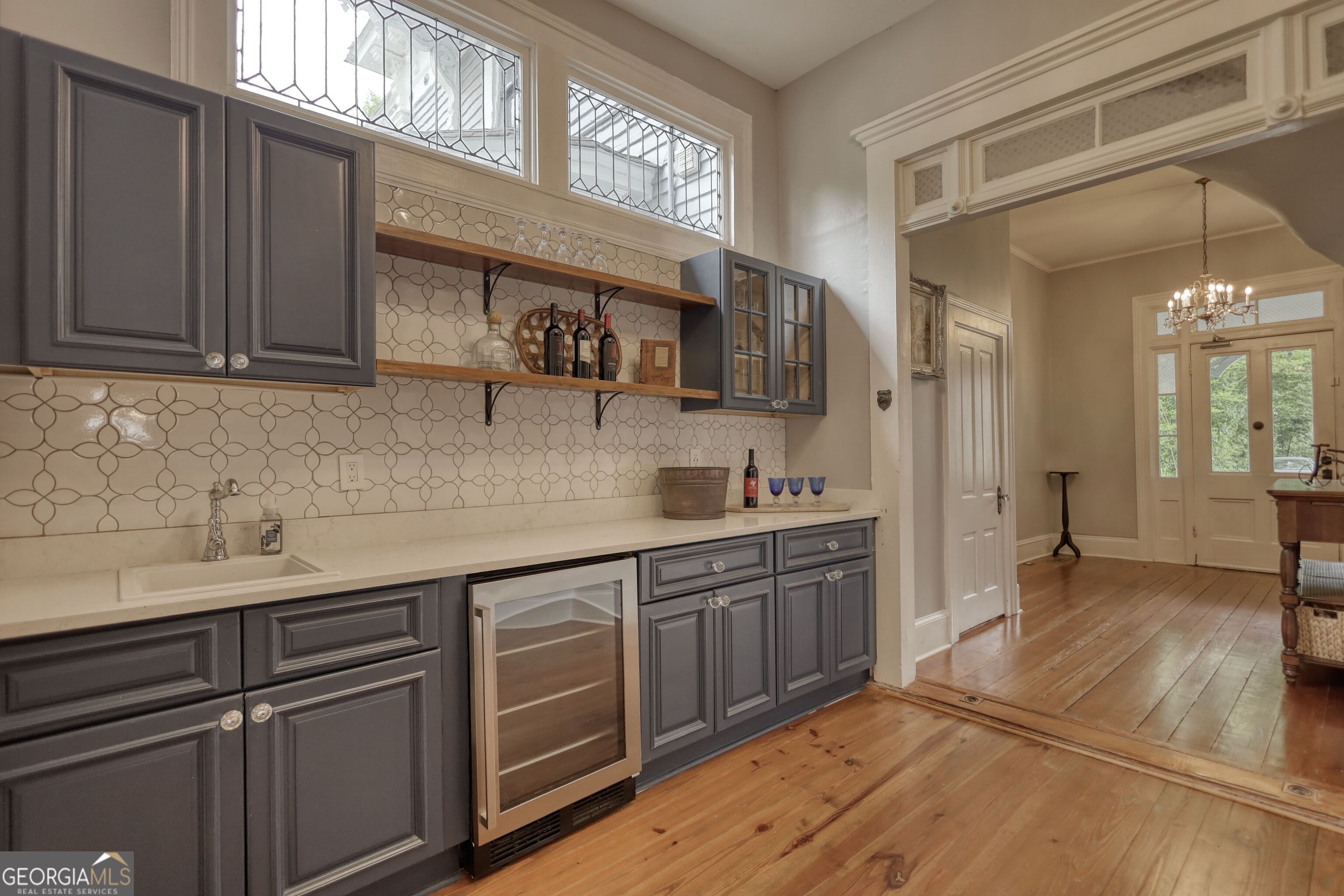 172 North 2nd Street Madison, GA 30650 - Photo 67 of 69 a kitchen with stainless steel appliances granite countertop a sink and cabinets