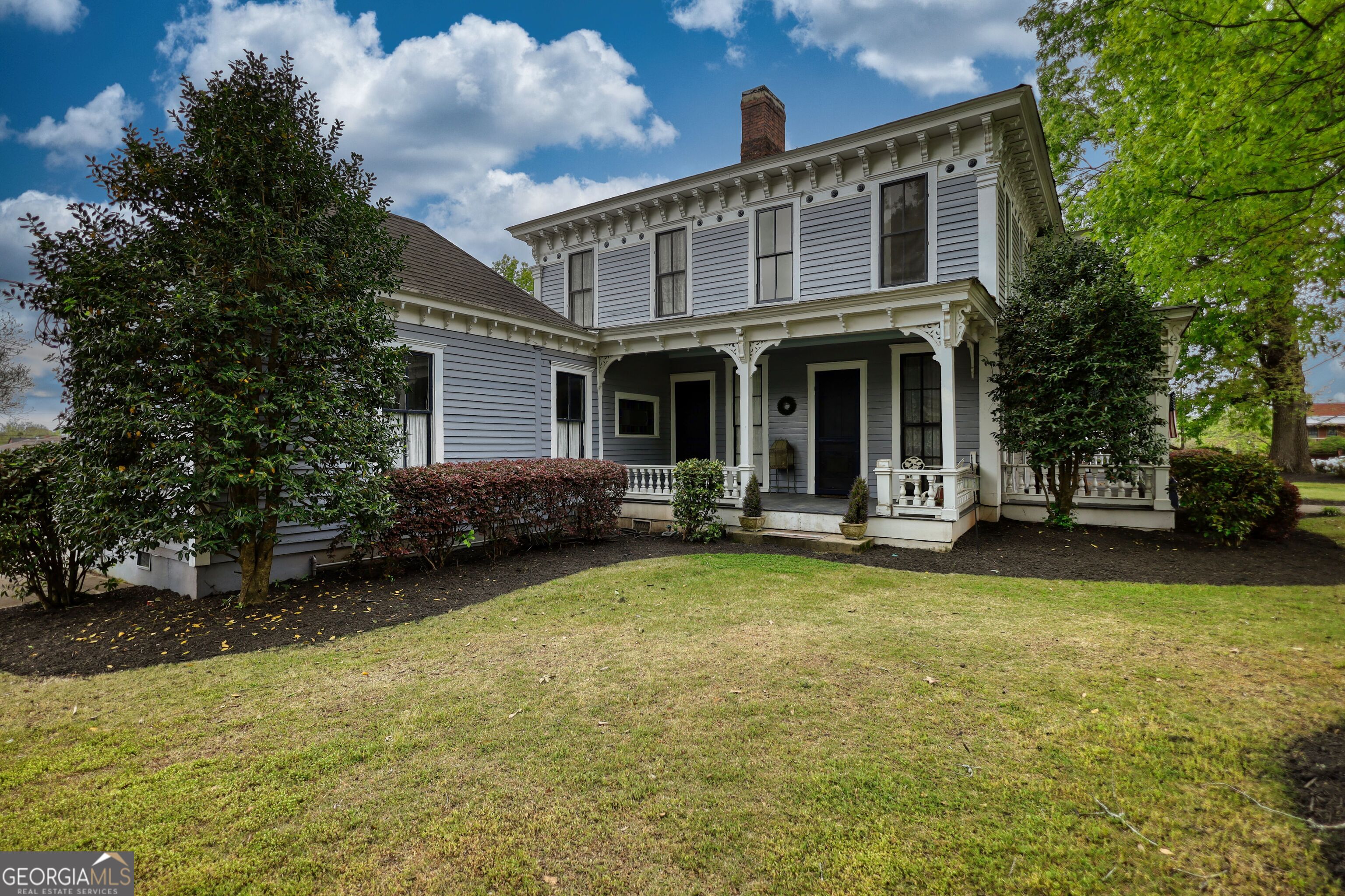 172 North 2nd Street Madison, GA 30650 - Photo 7 of 69 a view of a house with swimming pool and porch
