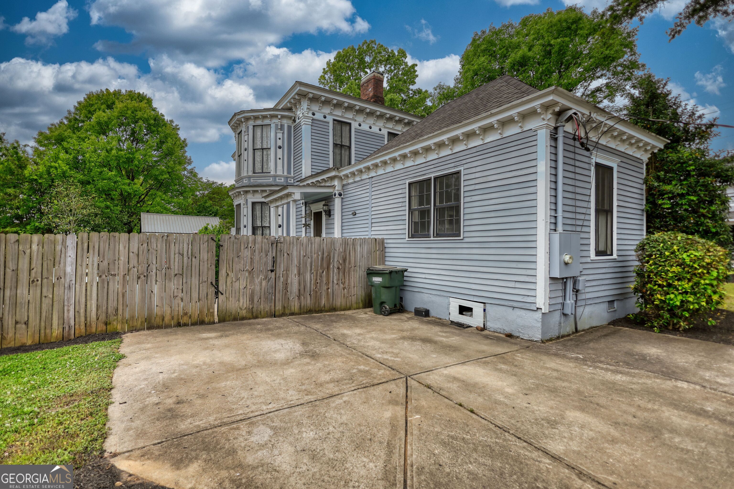 172 North 2nd Street Madison, GA 30650 - Photo 8 of 69 a view of a house with a yard
