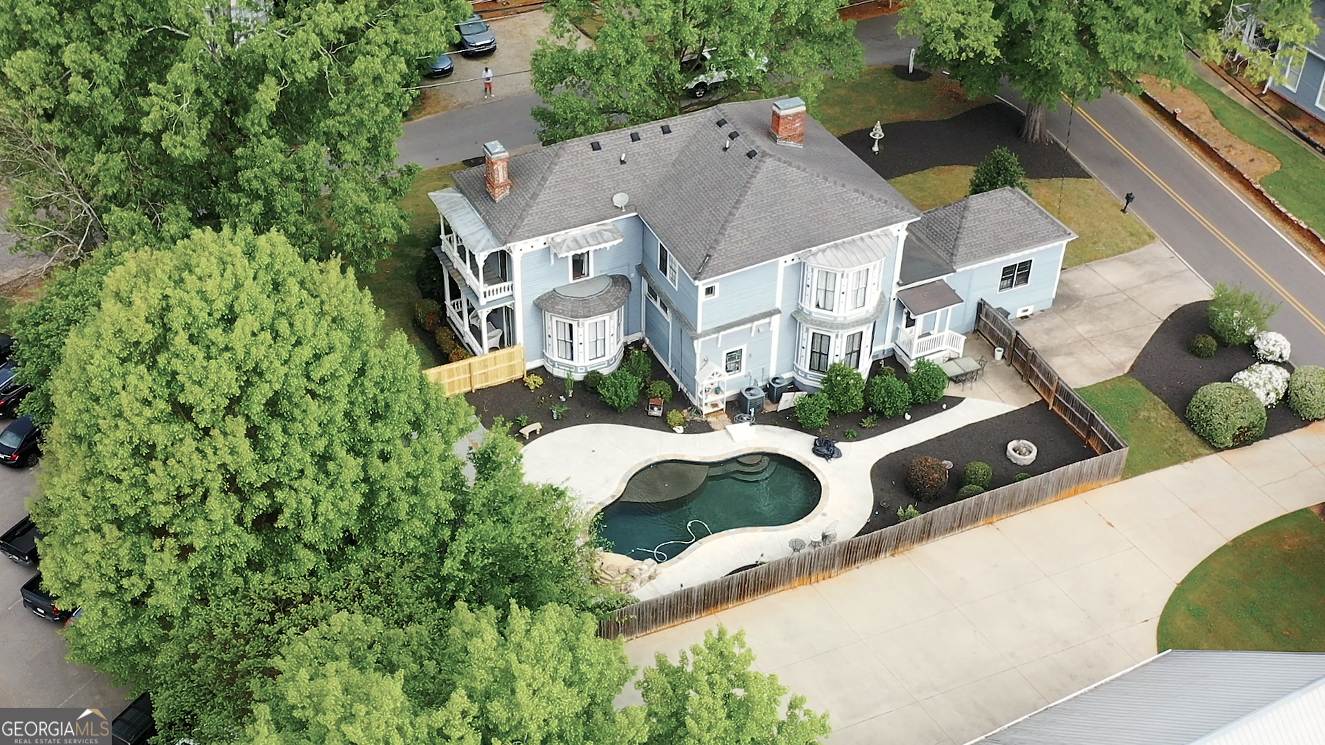 172 North 2nd Street Madison, GA 30650 - Photo 10 of 69 an aerial view of residential houses with outdoor space and street view