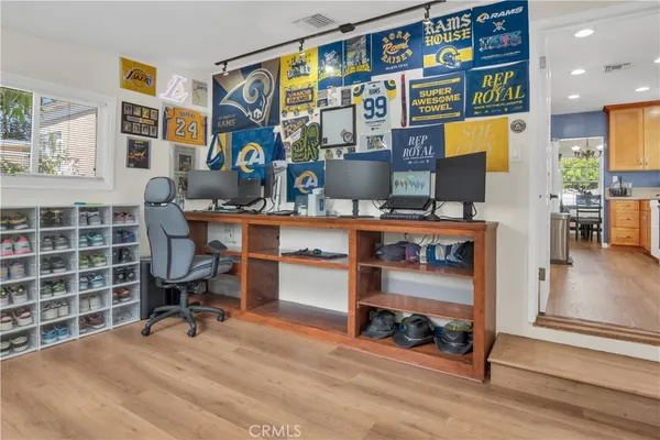 a room with furniture and gym equipment